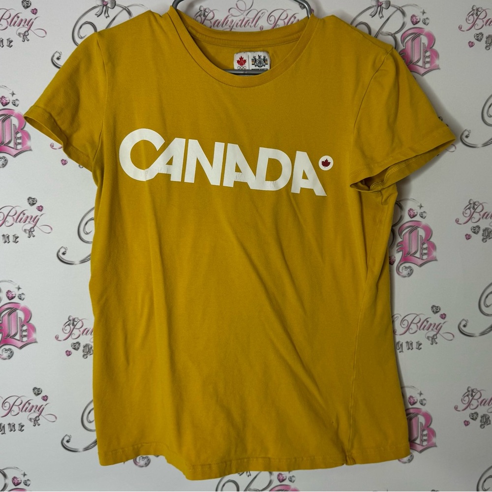 Hudsonβs bay co Olympic mustard rusty Yellow Canada T-Shirt - Picture 1 of 8